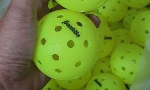 a lot of Franklin X40 outdoor pickleball balls displayed